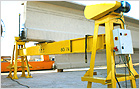 USEFUL FOR THE PRECAST INDUSTRY. Axle stands self-discharge for handling campaign beams (France)